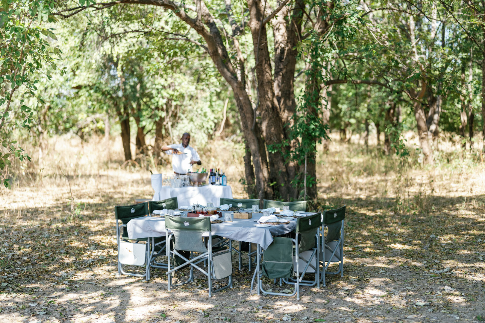 Setup of a bush lunch on the best safari in Zambia with Time + Tide